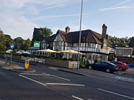 The Bells Of Ouzeley Harvester outside