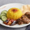 Nasi Kunyit With Beef Rendang And Sambal Eggplants