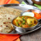 2 Pcs Plain Paratha Aloo Matar Gravy