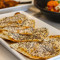 Cheese Grilled Naan With Red Leicester And Poppy Seeds